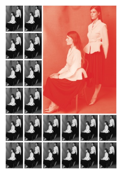 One large red-tinted photo and multiple smaller black and white replicas. Photo shows two women in white shirts and long black skirts; one sat on a chair and the other standing behind. 